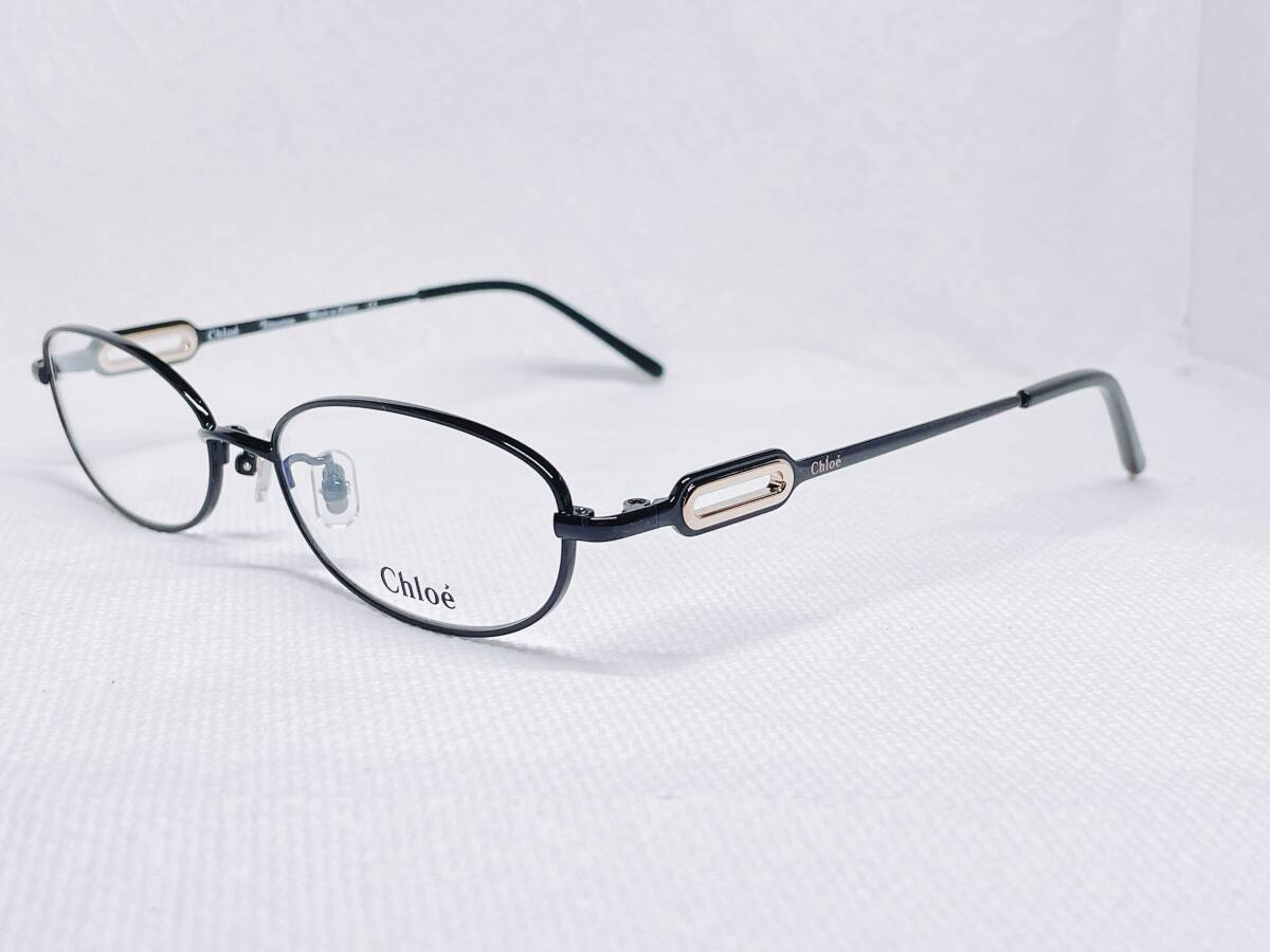 J-52. 新品 未使用 ブランド 日本製 国産 Chloe\' クロエ チタン オーバル 女性 黒 52□16 135 13g 保管品 眼鏡 メガネフレーム
