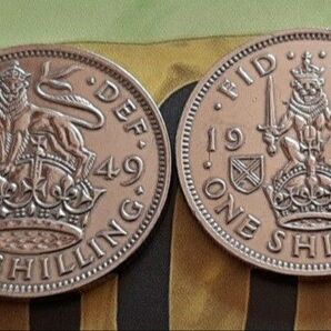 1949年のイギリス1シリング硬貨、ライオンと王冠のデザイン 額面: 1シリング- デザイン: ジョージ6世の肖像- 国
