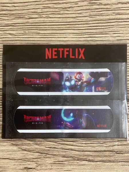 Netflix映画 ウルトラマンライジング特別上映会 配付ノベルティ品 絆創膏、エミ フィギュアのセット