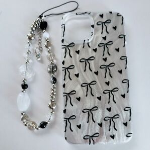 iPhone 13 14 15 16 スマホケース シルバー 黒 ブラック リボン キラキラ ストラップ付き かわいい