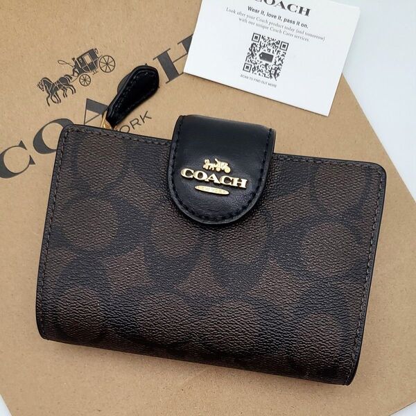 新品 COACH 折り財布 シグネチャー