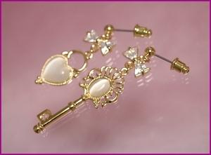 EP6791/ key lock cat's-eye semi long earrings high quality ribbon key key moonstone manner. cat's-eye earrings modification possibility 