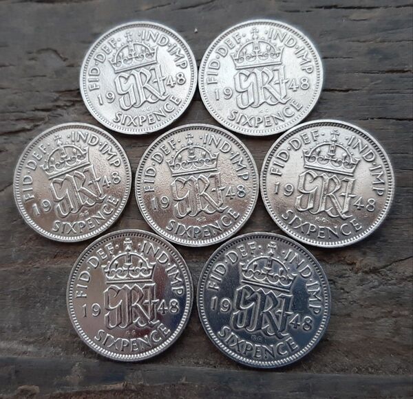 イギリス ブリティッシュ英国 1948年発行のシックスペンスコイン、王冠とジョージ6世のデザインが特徴。- 年号: 1948