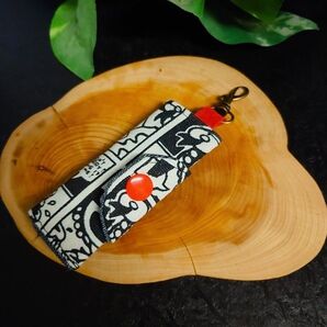 しつこい嫌がらせは通報します。小銭が入れられるキーホルダー キーケース小物入れ ハンドメイド ボタン赤 赤ちゃん柄