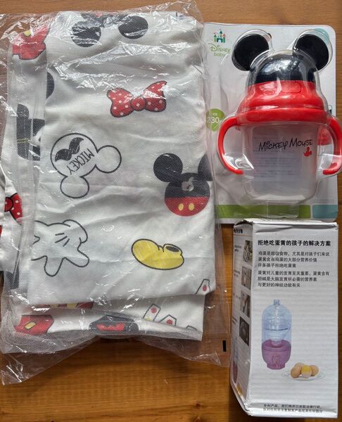 授乳カバーとミルク瓶と卵分離器