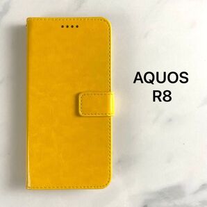 AQUOS R8 カバーSH-52D / A301SH 用 ケース マグネット式 ストラップ付き スタンド機能 PU革 イエロー
