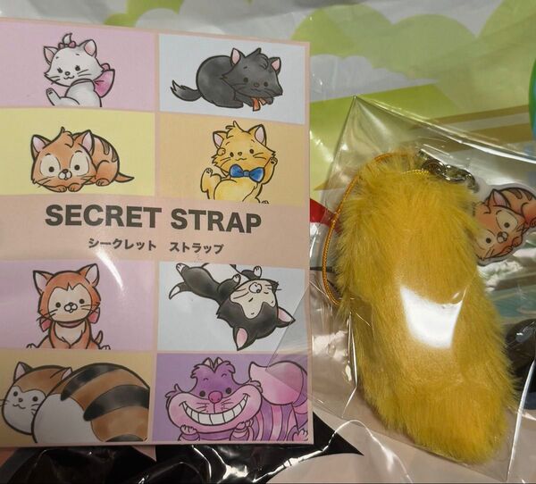 ディズニーストア シークレットストラップ しっぽ オリバー