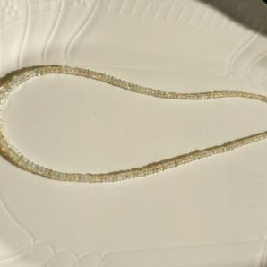 エチオピア産 プレシャスオパール 太め5-6mm厚みありスムースロンデル ボタン 透明感抜群 遊色あり 白