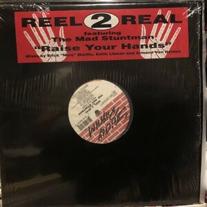 Reel 2 Real Featuring The Mad Stuntman / Raise Your Hands