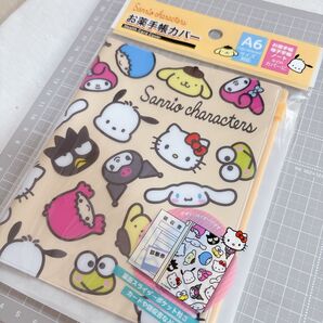 新品未使用 可愛い サンリオキャラクターズ サンリオ お薬手帳カバー フェイス A6サイズ対応 お薬手帳 母子手帳 ノートのカバー
