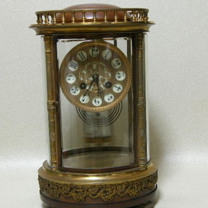 置き時計 フランス アンティーク 小判型 4面取りガラス ニッケル振り子 の画像1