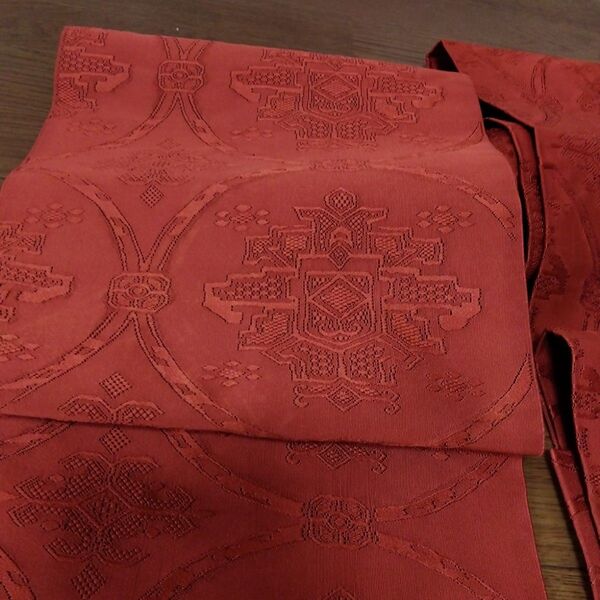 (正絹)名古屋帯 刺繍柄 落ち着いたオレンジ