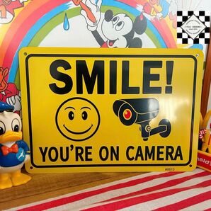 アルミ看板 ブリキ看板 スマイル② 防犯カメラ 監視カメラ アメリカン雑貨 ニコちゃん 世田谷ベース アメリカンフェンス