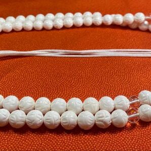 数珠 曹洞宗 ハス花の彫刻シャコ貝八本組紐 水晶仕立て 108念珠