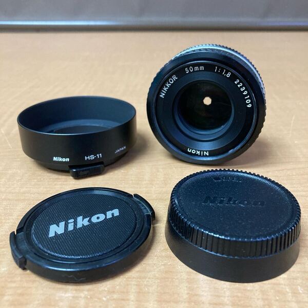 ◎送料無料 Nikon 50mm f1.8 単焦点レンズ 現状品 NIKKOR カメラレンズ ニコン マニュアル フォーカス オールド フード付き パンケーキ
