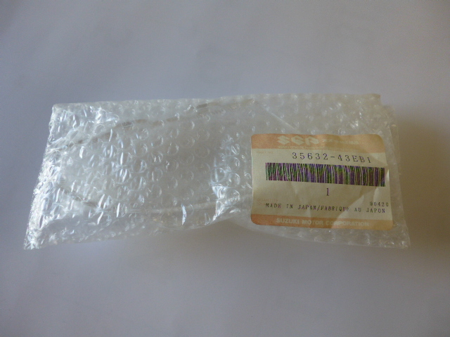 スズキレッツII純正左フロントウインカーレンズ 35632-43EB1未使用品