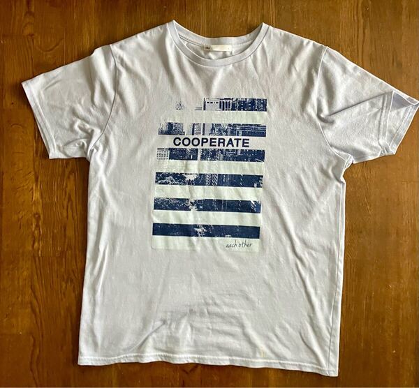 ikka each other COOPERATE 半袖Tシャツ 水色カラー難あり