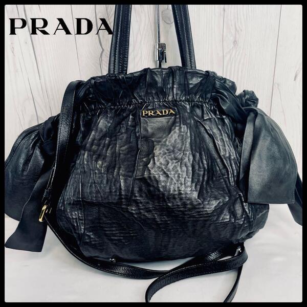 【 美品 】 PRADA プラダ ショルダーバッグ リボン レザー ブラック 黒 バッグ ハンドバッグ シワ加工 カバン 鞄