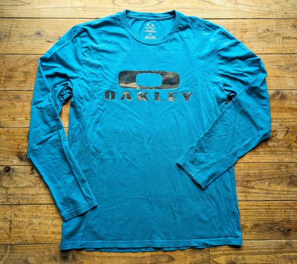 送料無料♪オークリー OAKLEY カットソー ロンTシャツ size L メンズ 100% コットン カモフラロゴプリント USED古着 Y2K アウトドア