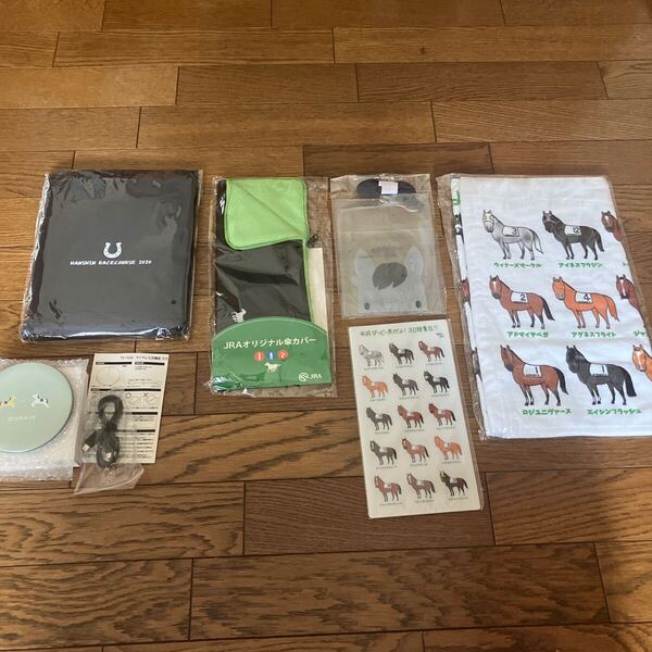 競馬JRA UMAJOワイヤレス充電器・おがわじゅりタオル・イベントポンチョ・傘カバー・マークカードホルダーなど