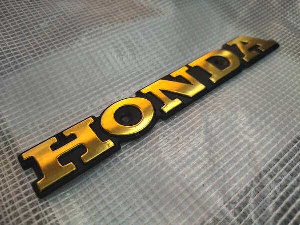 【ゆうパケット送料込】HONDA 3Dエンブレム ゴールド 平面用 縦2.5cm×横16.5cm ホンダ 金属製