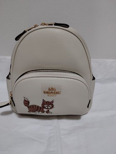 お値下げ!新品COACH コーチ キャットチャーム付き ミニリュック ホワイト猫柄