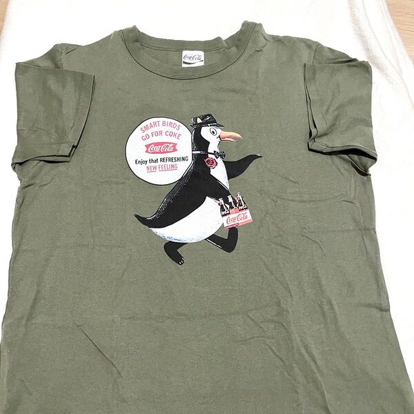 GU 新品未使用 カーキ 綿100 半袖 Tシャツ コカ・コーラ ペンギン