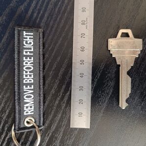 キーホルダー REMOVE BEFORE FLIGHT ストファイ