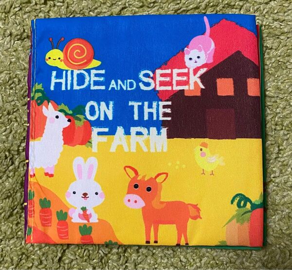 匿名配送 新品 農場の中のかくれんぼ布絵本 英語 しかけ絵本 おもちゃ 0歳 1歳