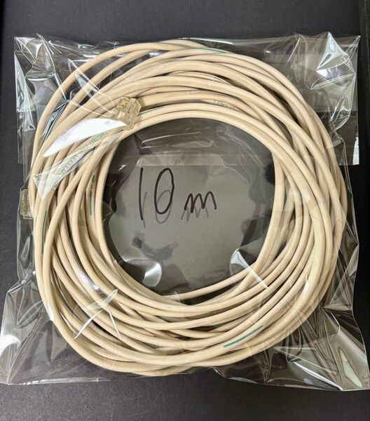 サンワサプライ シールド付ツイストモジュラーケーブル アイボリー 10m TEL-ST-10N2