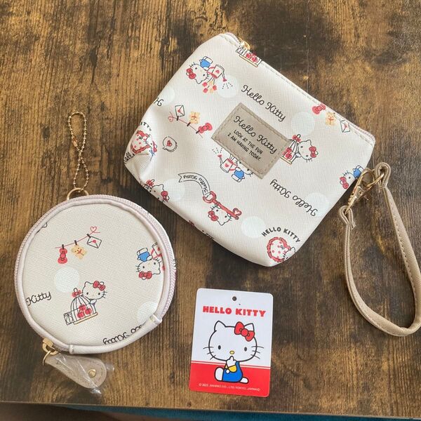 【Sanrio】 ハローキティ HELLO KITTY 背面ティッシュポケット付きミニポーチ&丸型ポーチ 2点セット【新品未使用】