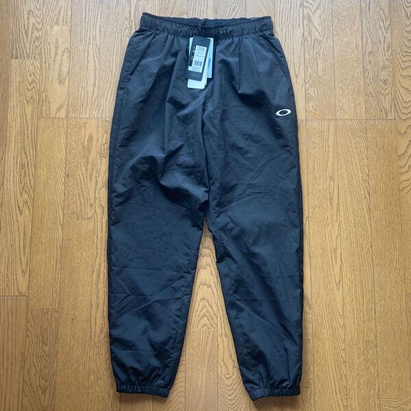 【未使用】オークリー OAKLEY メンズ 撥水 防風 ウインドブレーカー ロングパンツ Sサイズ