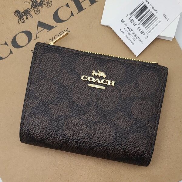 新作 COACH 折り財布 シグネチャー