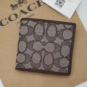 新品 COACH 折り財布 二つ折り財布 シグネチャー