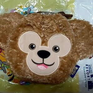 新規・評価10以下取引不可【新品・タグ付き・未使用】東京ディズニーシー ダッフィー お顔型の巾着 きんちゃくポーチ