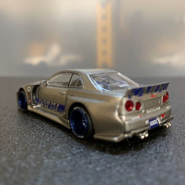 76 ニッサン スカイライン GT-R R34 1/64スケール ダイキャストミニカー