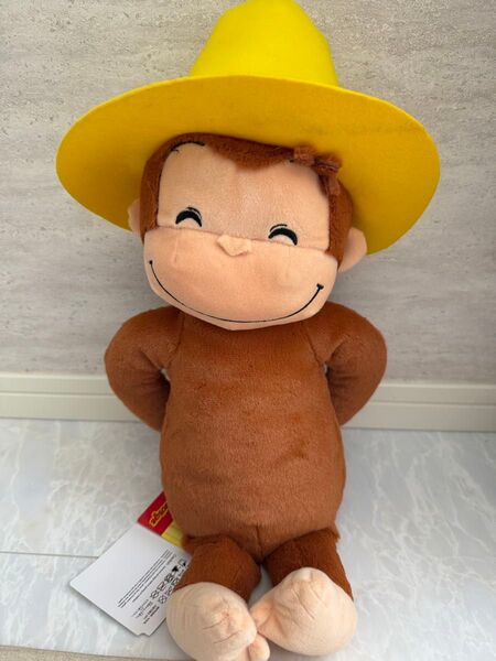 新品 タグ付き おさるのジョージ LLぬいぐるみ黄色い帽子 ぬいぐるみ