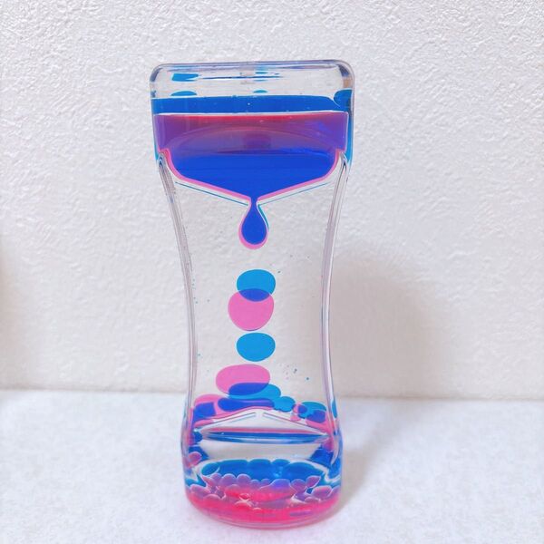 液体砂時計 オイル砂時計 おもちゃ オイルモーション ブルー ピンク リキッドモーション おもちゃ 置物 癒し 単品 1個 知育