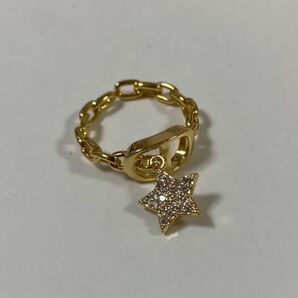 キラキラ CDロゴ リング スター ゴールド キラキラ ビジュー 指輪 フリーサイズ