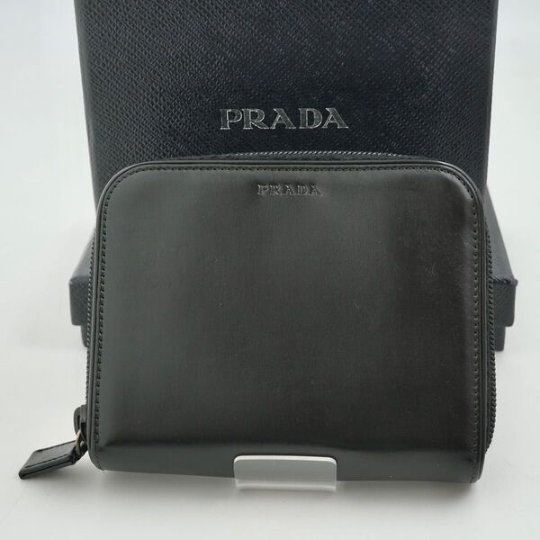 【極美品】PRADA フラップ スナップ ジッピー ブランドロゴ ブラック コンパクトジップ ラウンドファスナー