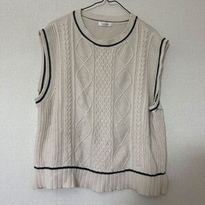 ベスト 編み込み