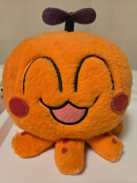 ヘリたこプーちゃん(オレンジ色のキャラクターぬいぐるみ)