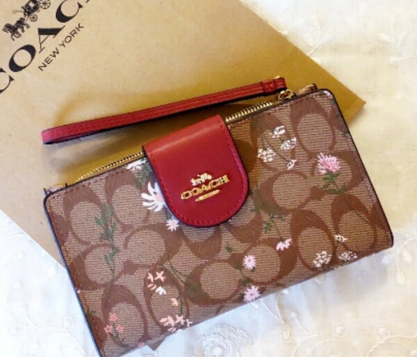 ◯〈未使用品〉【COACH 】 コーチ 長財布 スマホケース シグネチャー ワイルドフラワープリント ブラウン×花柄 財布 ◯