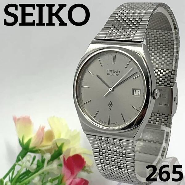 265 稼働品 SEIKO メンズ 腕時計 セイコー シルバー デイト 日付 電池交換済 クオーツ式 諏訪工場マーク 人気 希少 ビンテージ