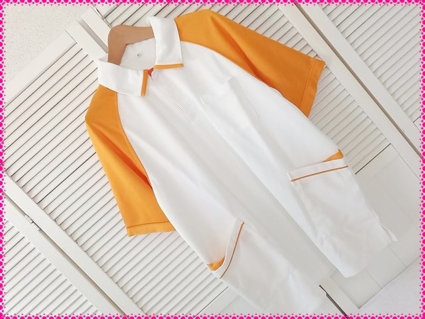 【送料無料】LL * 新品 男女兼用ポロシャツ♪ ホワイト×オレンジ 介護 看護 医療 ヘルパー ユニフォーム 左右ポケット