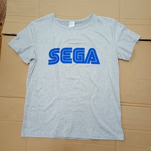 新品未使用 SEGA Tシャツ レディースLサイズ 半袖Tシャツ グレー メガドライブ SG-1000 セガサターン 異世界おじさん