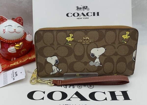 コーチ COACH 長財布 財布 シグネチャー スヌーピー ピーナッツ コラボ ブランド 大容量 誕生日 新品 未使用 ファッション CE705 C147