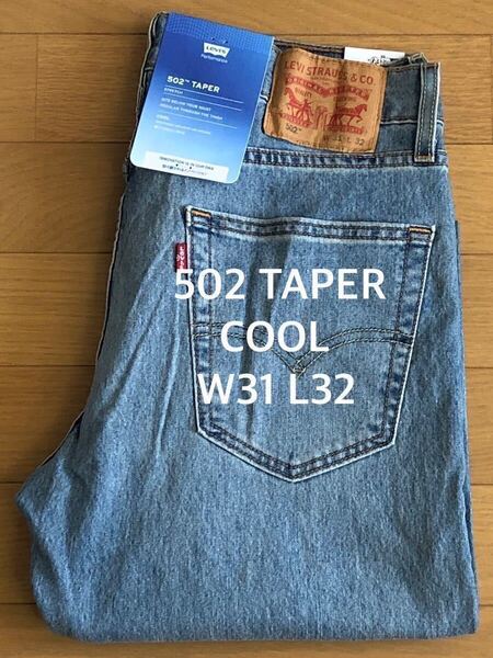 Levi's 502 TAPER COOL WORN INミディアムインディゴW31 L32