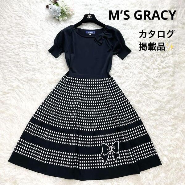 カタログ掲載 M’S GRACY エムズグレイシー ワンピース 38 黒 白 リボン 半袖 現行品 春夏 美シルエット Aライン 旅行 伸縮性あり 細見え