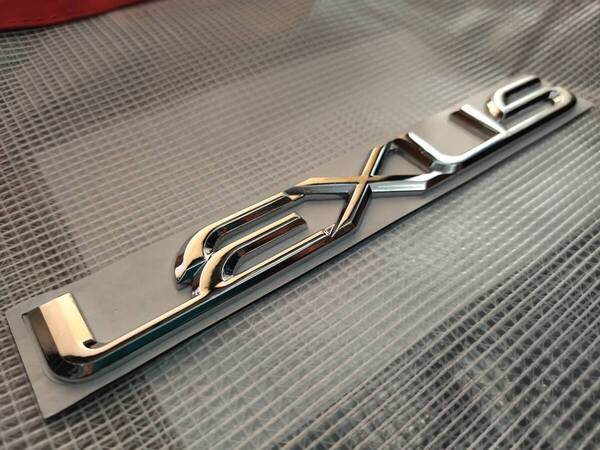 【ゆうパケット送料込】LEXUS(レクサス) 3Dエンブレム(両面テープ付) メッキシルバー 縦2.4cm×横19cm 金属製